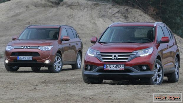 Mitsubishi Outlander und Honda CR-V - Autos, die von beträchtlicher Beliebtheit unter SUVs rühmen können